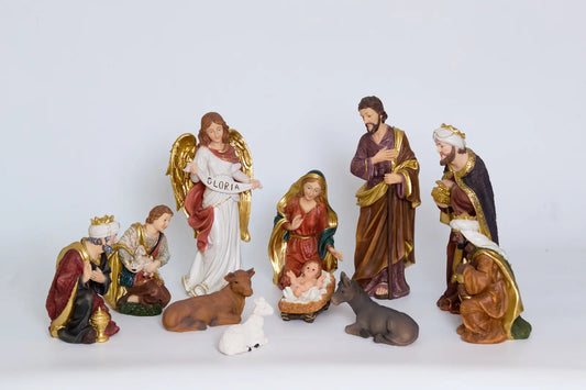 Christmas nativity figurines arranged as mantel decor, faith-based holiday centerpiece.