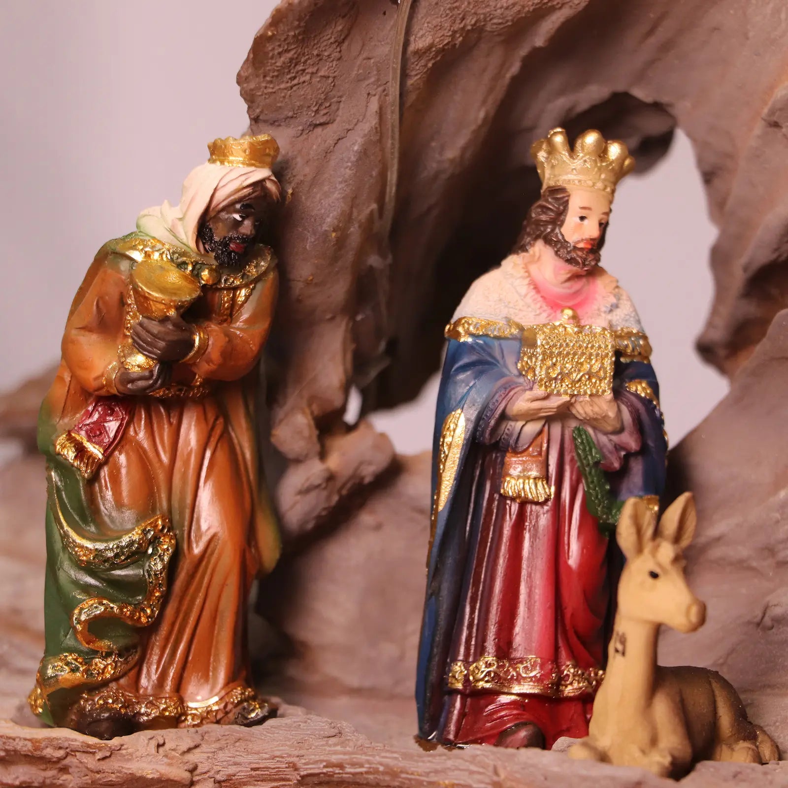 Three Wise Men figurines bringing gifts in detailed Christmas nativity set