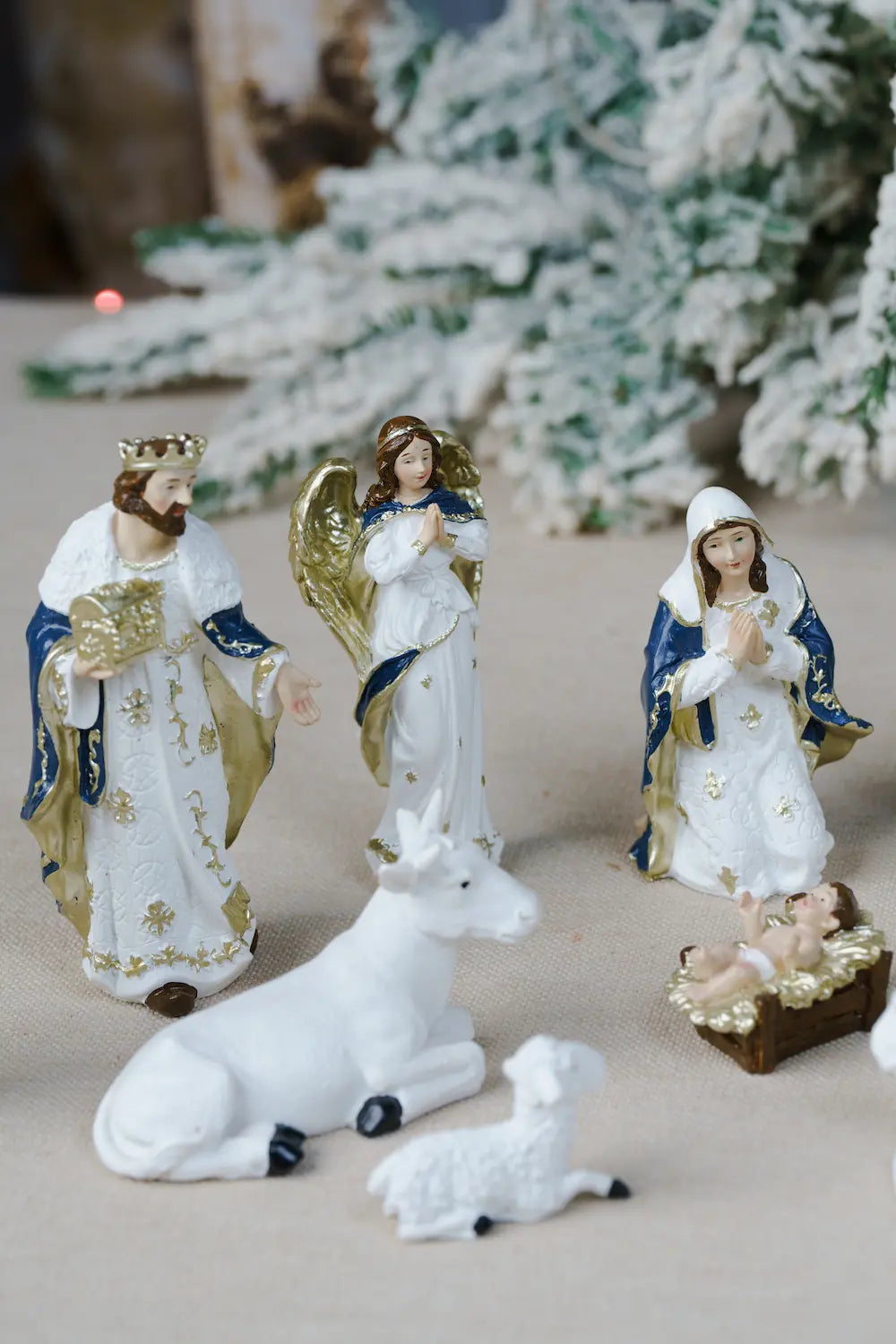 praying angel wise man mary blue white nativity scene