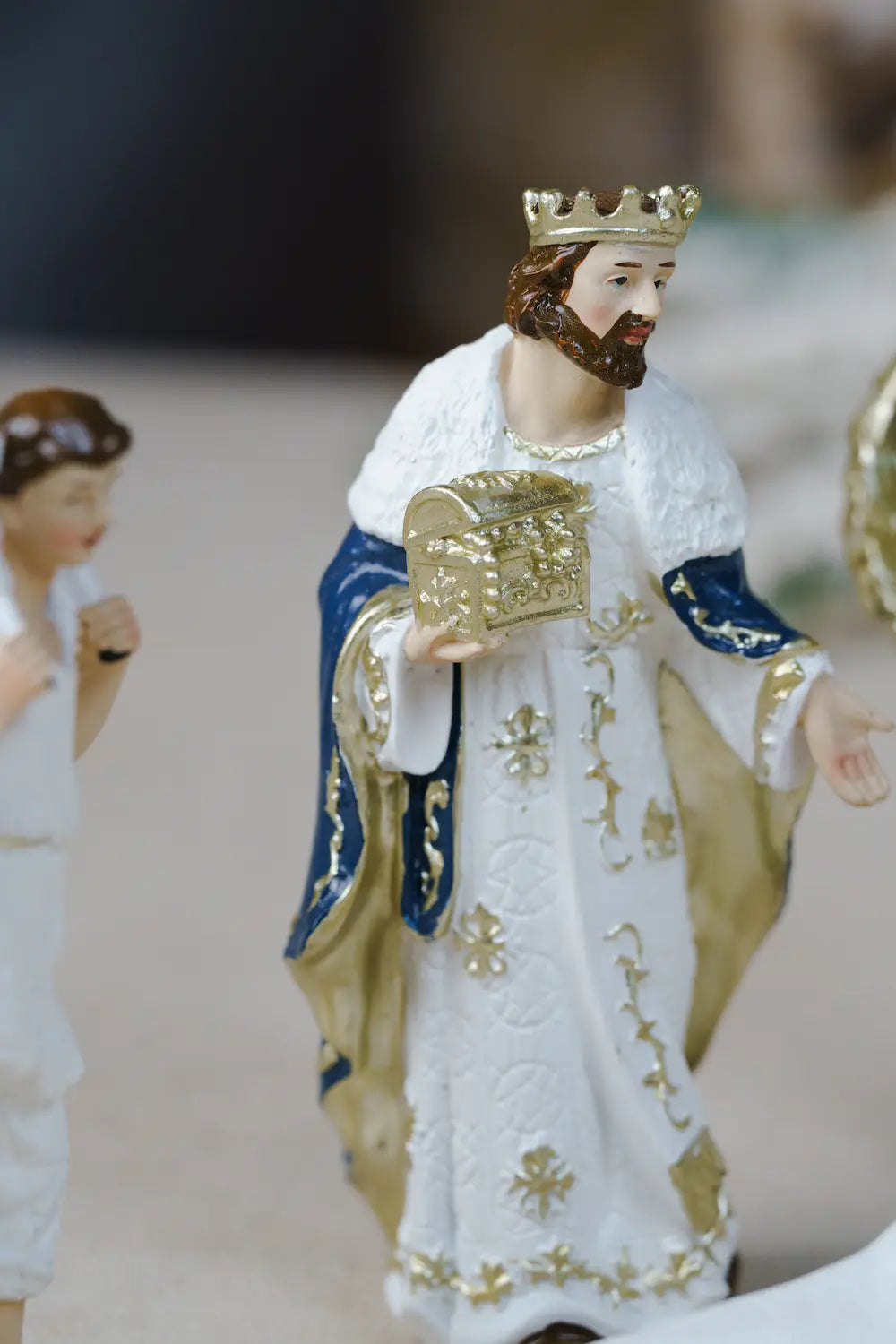 wise man king golden crown chest blue white nativity
