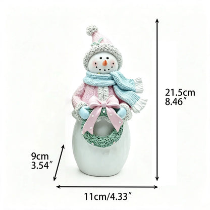 Female snowman figurine with dimensions 21.5cm height, 11cm width, 9cm depth displayed on white background
