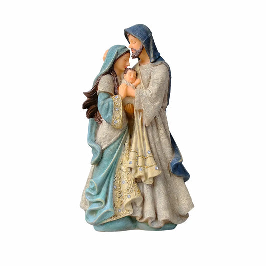 Complete Holy Family statue — Mary and Joseph embracing over swaddled Baby Jesus, hand-painted resin figurine on white background