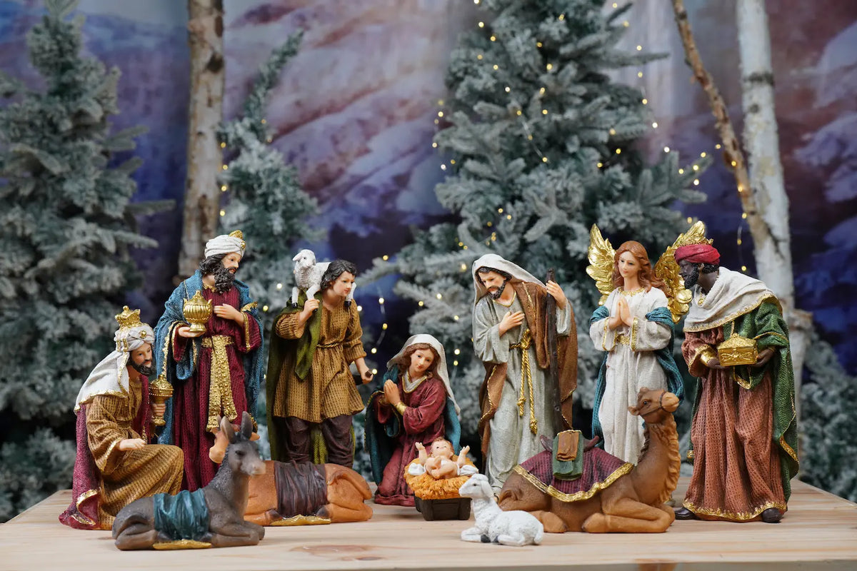 Colorful nativity scene set displayed indoors as Christmas tabletop decor, Bethlehem crèche style