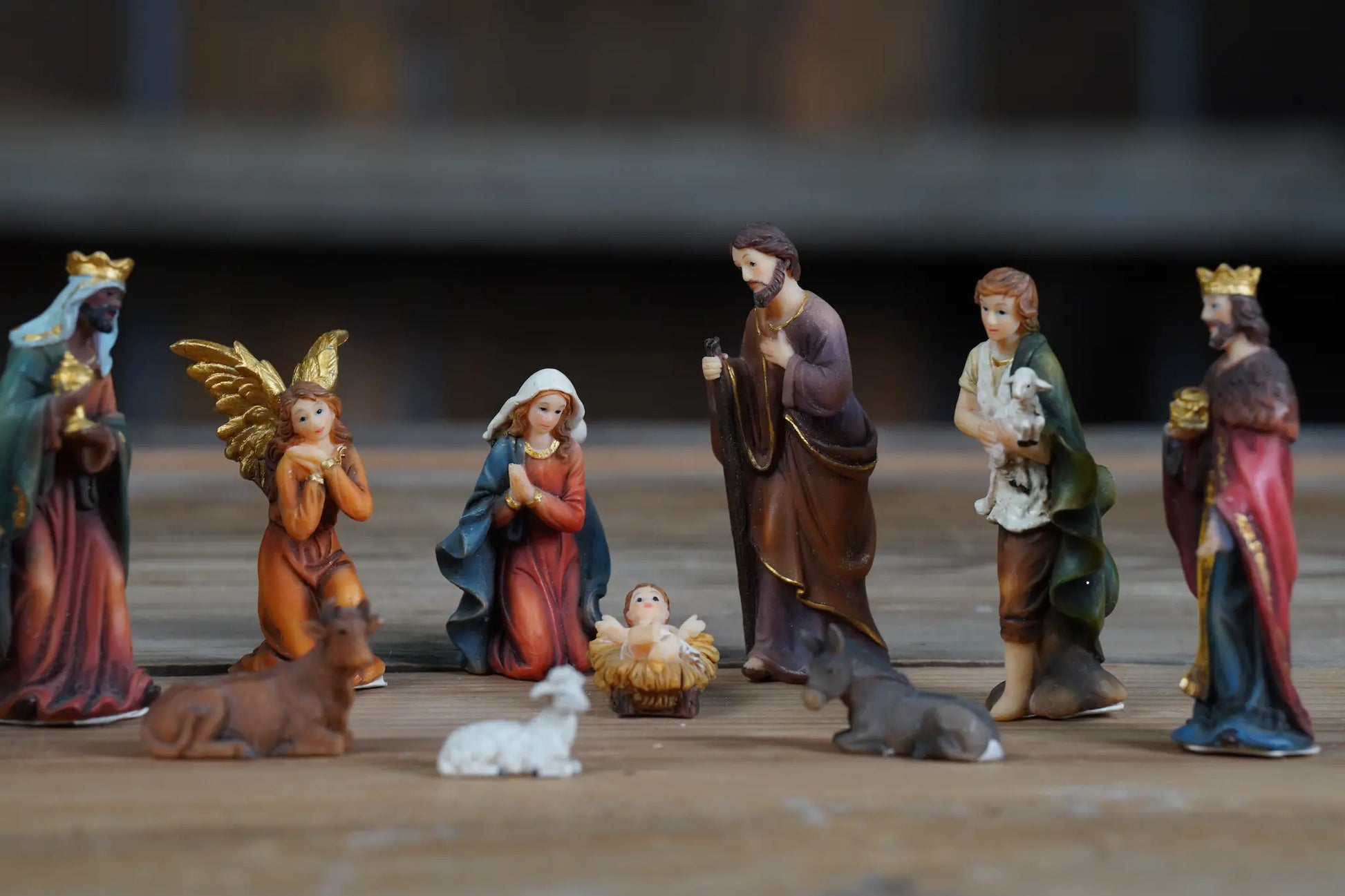 Mini nativity creche display photo, Holy Family and Wise Men tabletop arrangement.