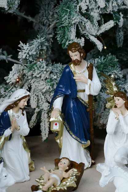 holy family joseph with lantern mary kneeling angel nativity scene