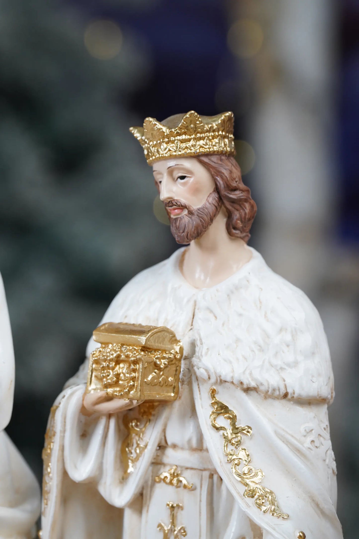 White and gold Wise King nativity figurine close-up
