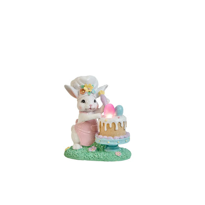 Light-up Easter bunny decoration with glowing LED egg on cake