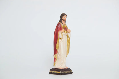Sacred Heart of Jesus statue showing crimson mantle and gold trim, Side view