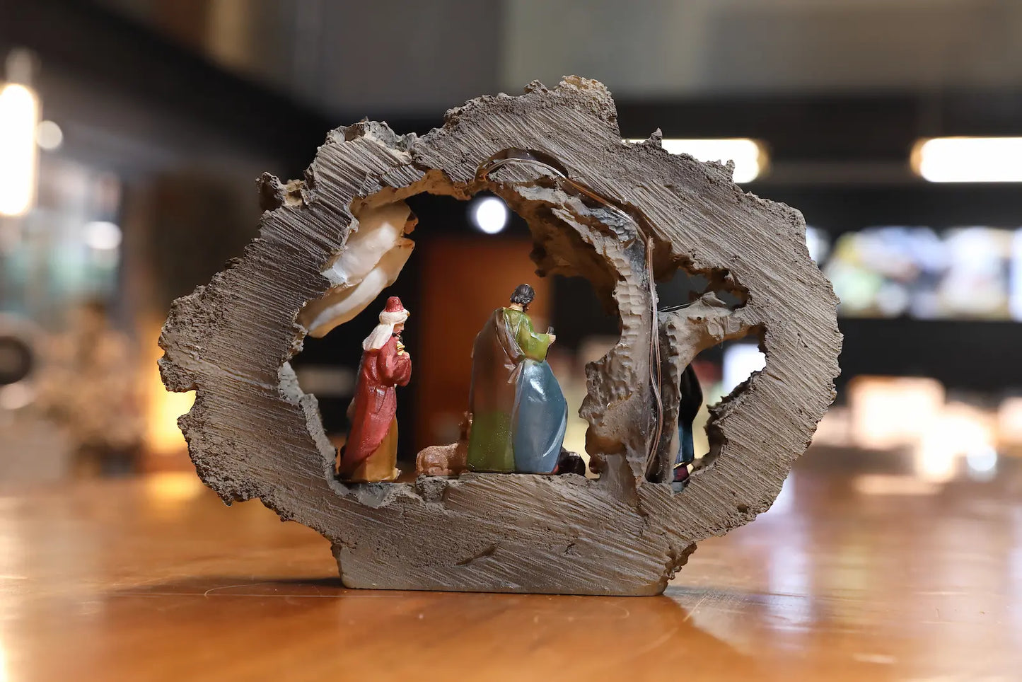 Back view of battery compartment on illuminated Christmas nativity stable decoration