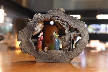 Back view of battery compartment on illuminated Christmas nativity stable decoration