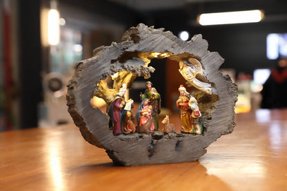 Warm glowing LED nativity scene displayed on tabletop during Christmas season