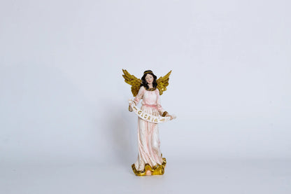 Gloria herald angel nativity figurine close-up — hand-painted resin angel with gold wings and Gloria scroll banner