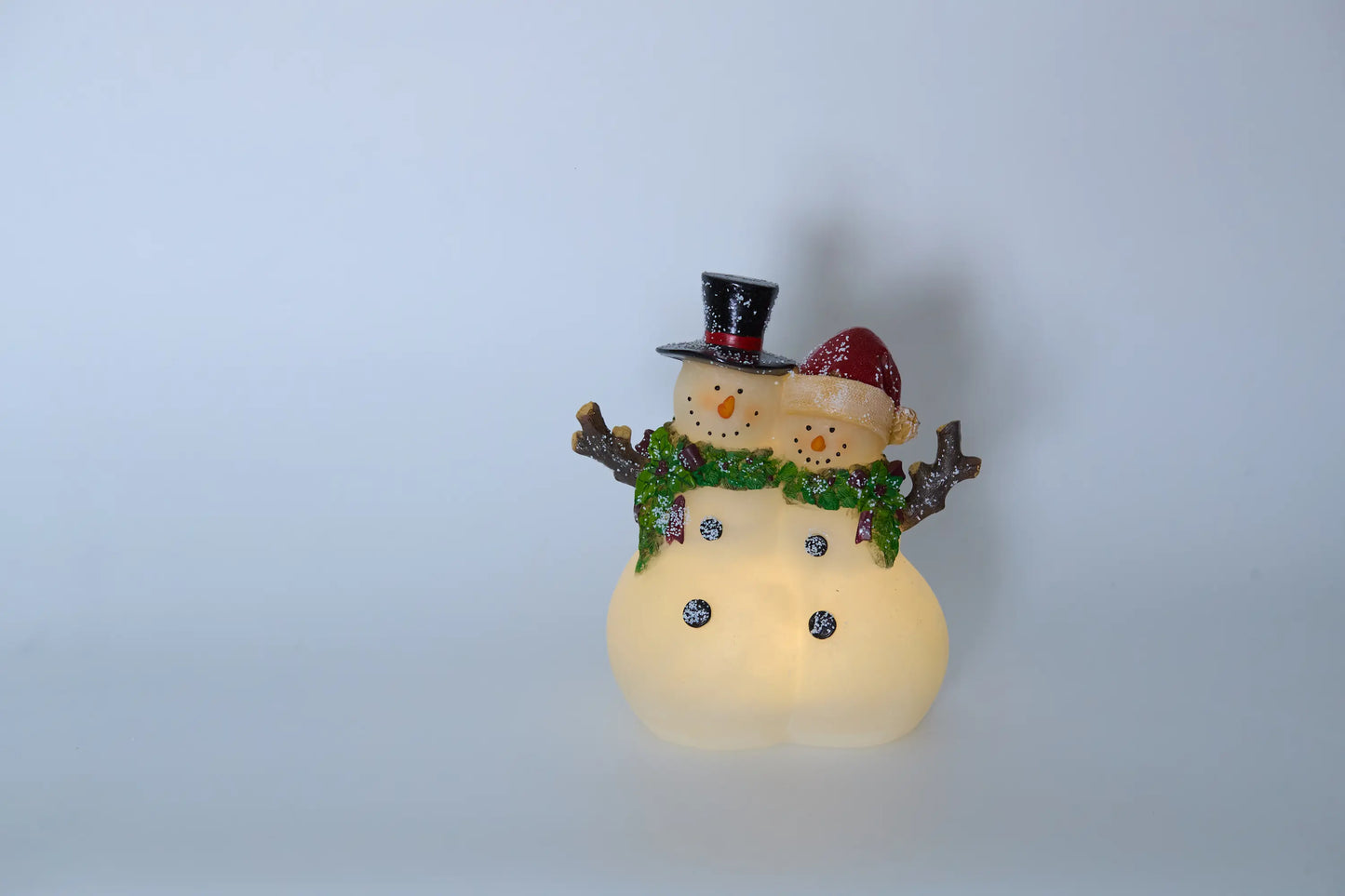 Zayton snowman couple figurine side view