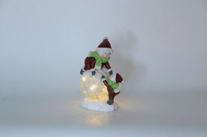 Lighted snowman figurine with warm white LED crackle-glass sphere