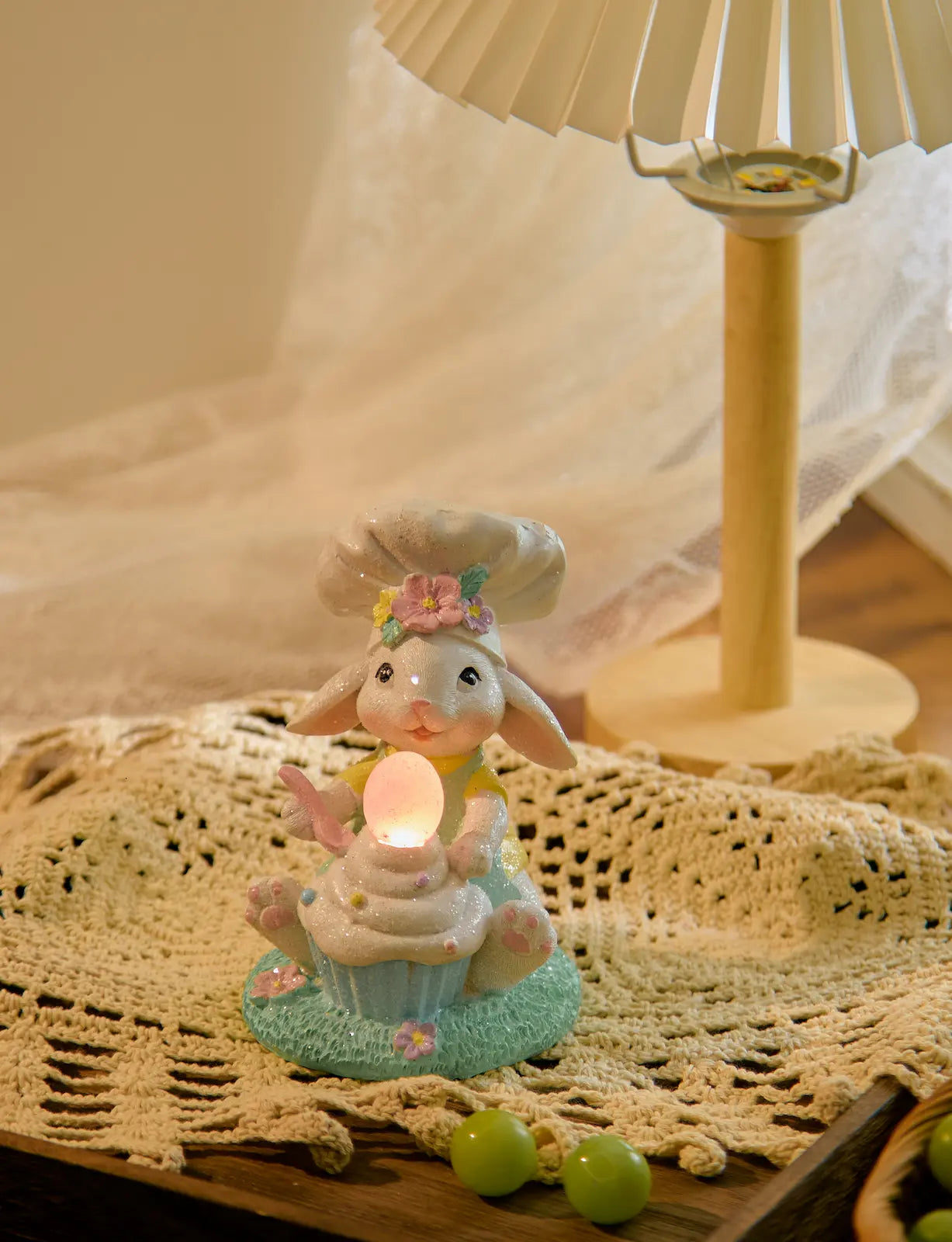 Glowing Easter egg bunny cupcake decor under lamp