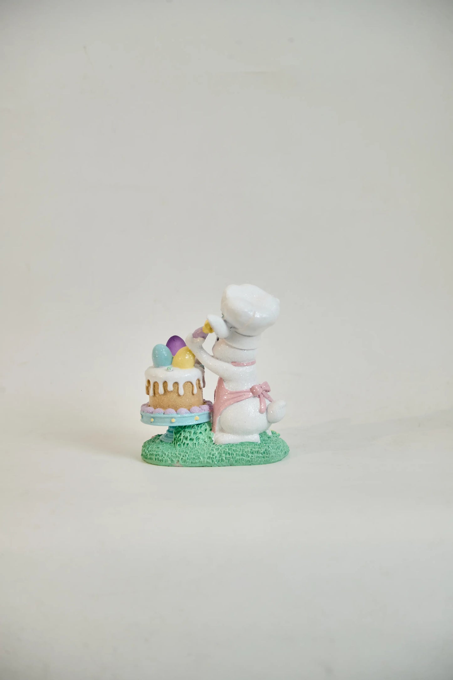 Easter bunny chef figurine side view showing detailed craftsmanship