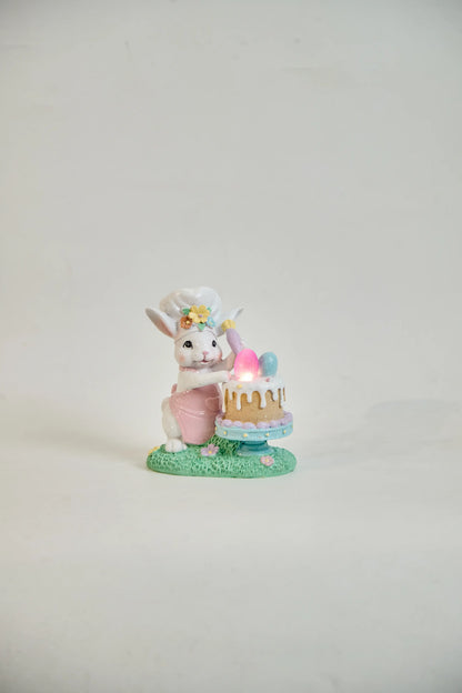 Light-up Easter bunny chef decoration glowing pink egg front view
