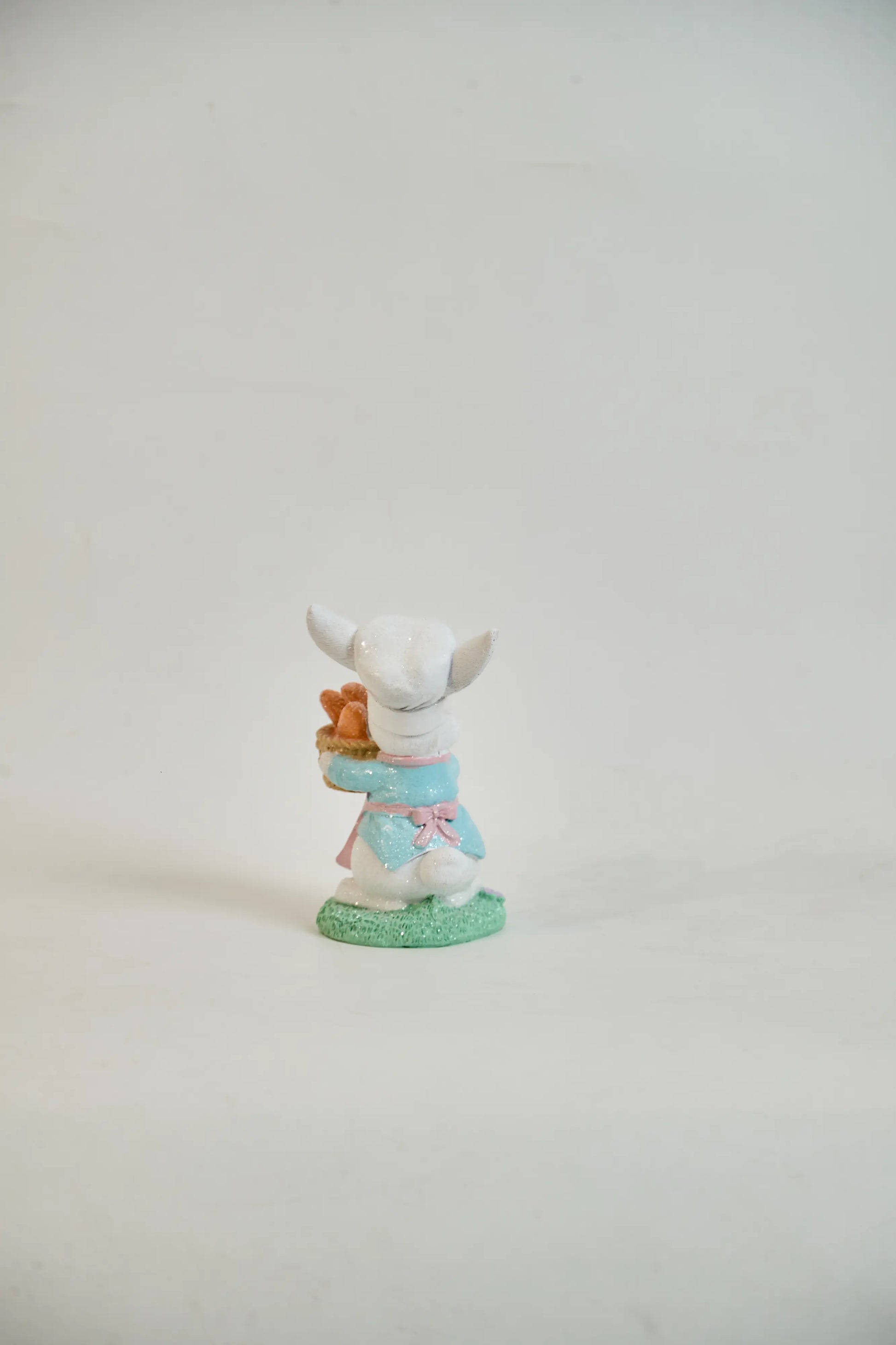 Hand-painted rabbit baker figurine rear angle