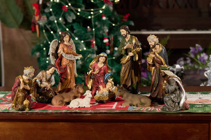 Christmas creche figurines arranged for home decor, Holy Family and Magi scene.