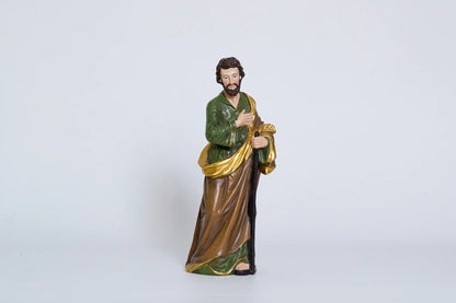 Joseph figurine holding staff, Holy Family nativity figure with gold accents.