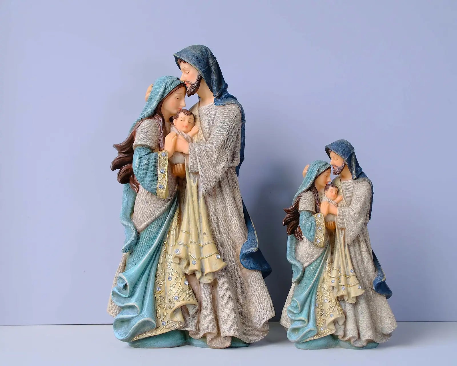 Holy Family statue size comparison — 11.75 inch and 8 inch hand-painted resin figurines side by side