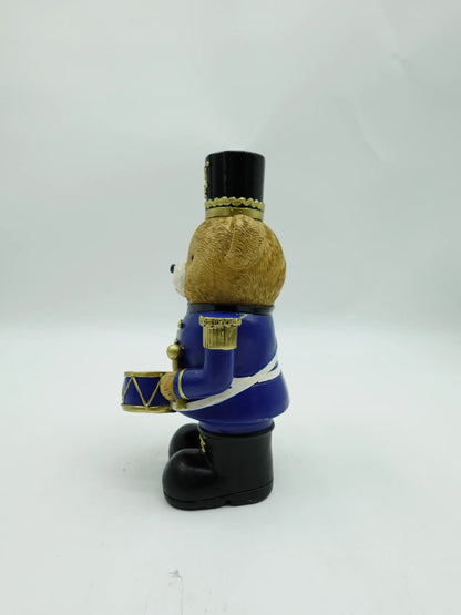 the Christmas teddy bear drummer figurine in blue uniform, side view