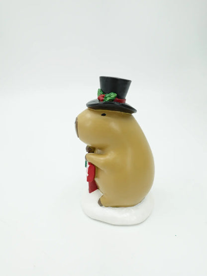 the capybara JOY sign figurine showing the top hat profile and the signpost detail