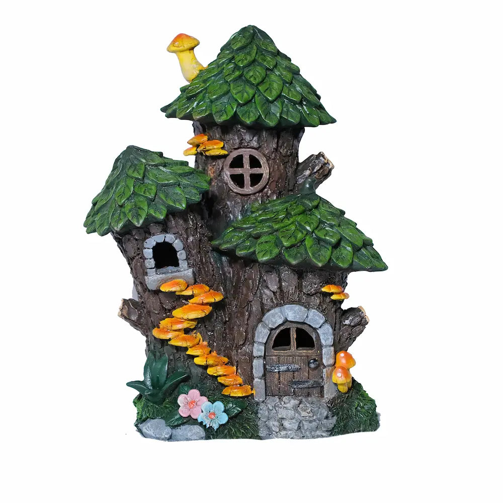 Whimsical resin tree stump fairy house