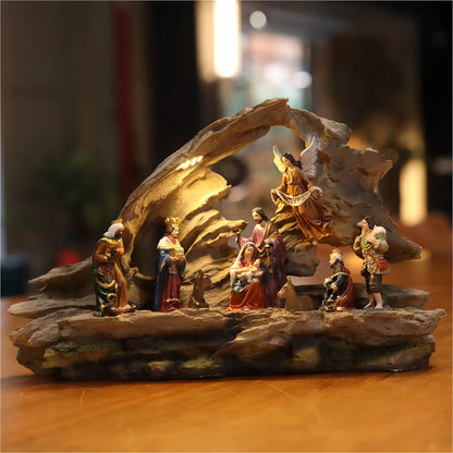 Warm LED illuminated nativity scene display with Christmas figurines