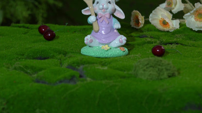 Video of Zayton Easter bunny chef figurine seated with golden spoon 