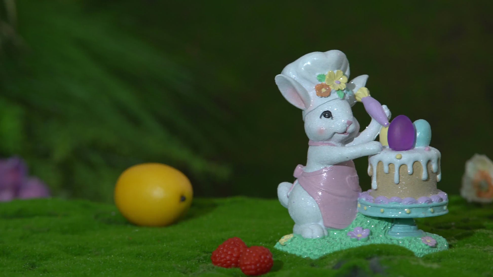 Light-up Easter bunny chef cake figurine rotating with glowing LED egg, hand-painted resin spring decoration by Zayton