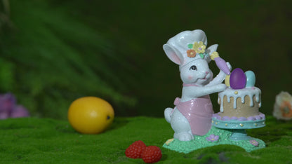 Light-up Easter bunny chef cake figurine rotating with glowing LED egg, hand-painted resin spring decoration by Zayton