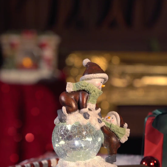 Video of Zayton Lighted Snowman Figurine with Crackle Glass Ball